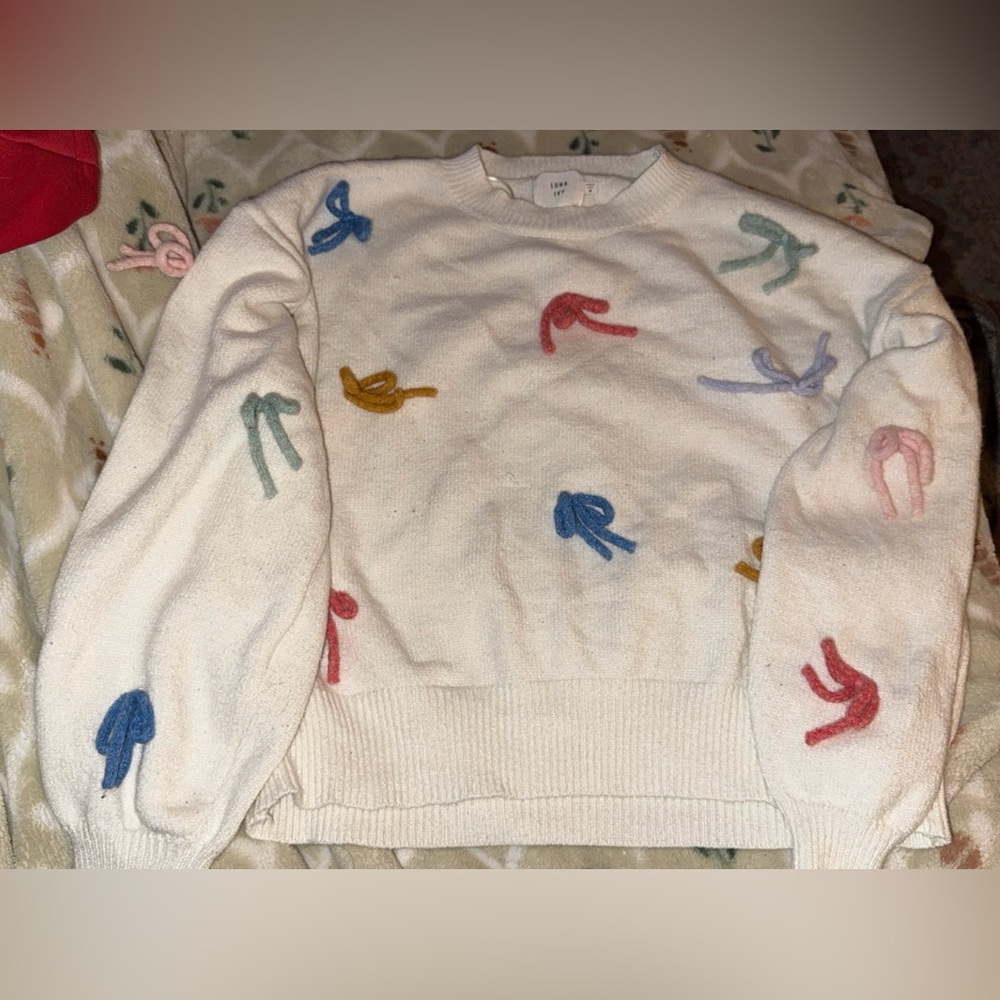 Colorful Patterned Sweater with bows